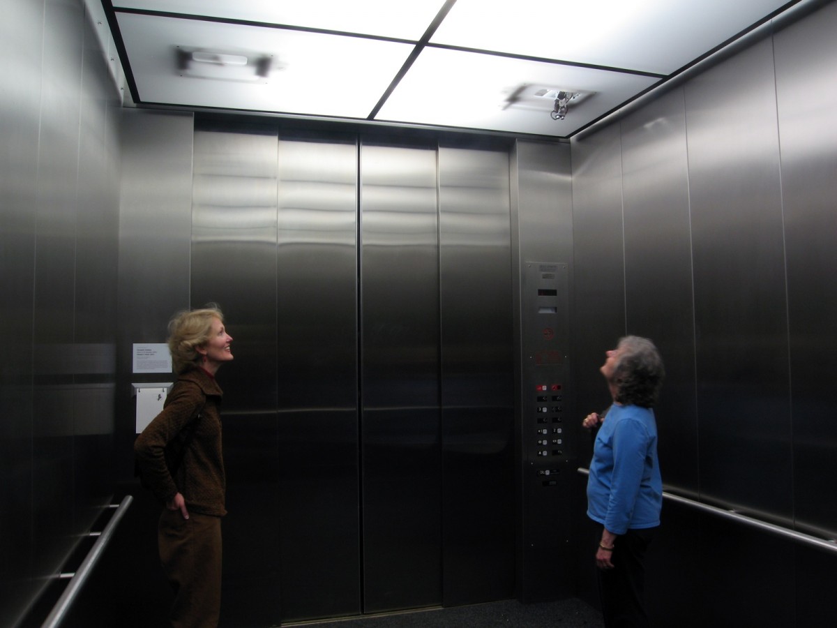 Elevator blonde fan photos